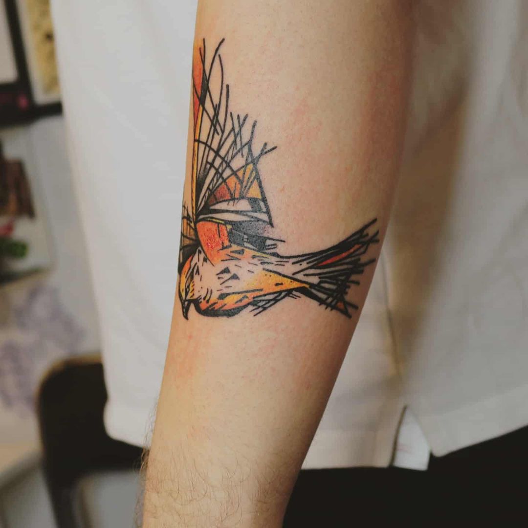 Tatuaż graficzny ptak w kolorze – Patryk – Terra Tattoo Kraków